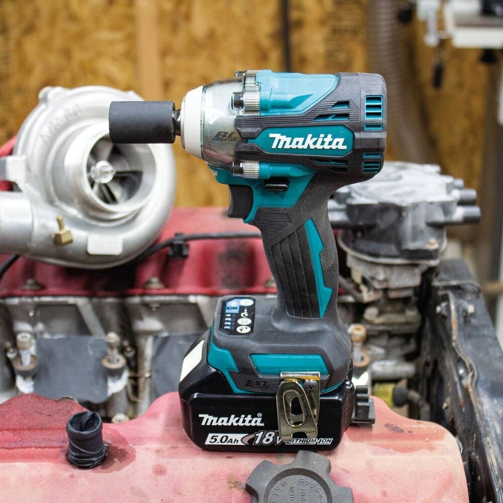 Makita XWT15T 18V LXT Lithium-Ion Brushless Cordless 4-Speed 1/2" Sq. Drive Impact Wrench Kit w/ Detent Anvil, var. spd., rev., L.E.D. Light, bag (5.0Ah)